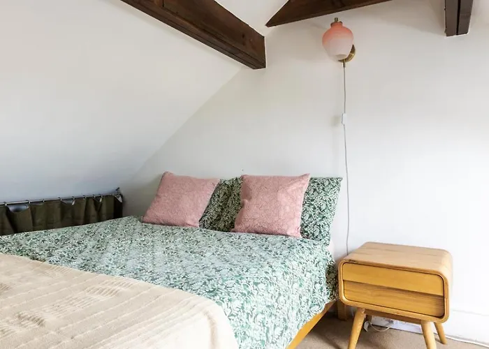 En-Suite With Double Bed On Mezzanine And Desk In Family Home