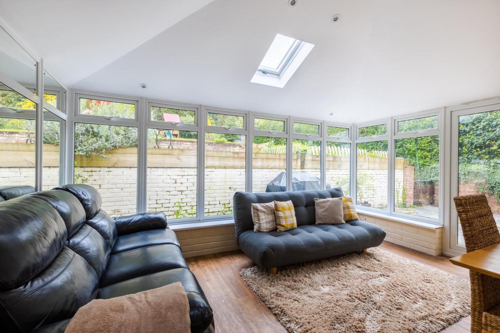 En-suite With Double Bed On Mezzanine And Desk In Family